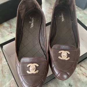 CHANEL brown quilted loafer with metal lock detail size 40. Fits like 9 1/2.
